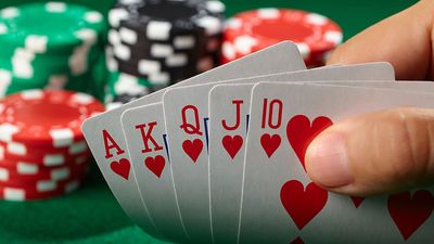 Poker game. Card game. Royal Flush in poker. Hearts suit gambling