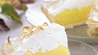 Slices of lemon pie topped with meringue.