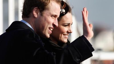 Prince William and Kate Middleton wave to the crowds after officially launching the new RNLI's lifeboat 'Hereford Endeavour' at Trearddur Bay, Anglesey on February 24, 2011